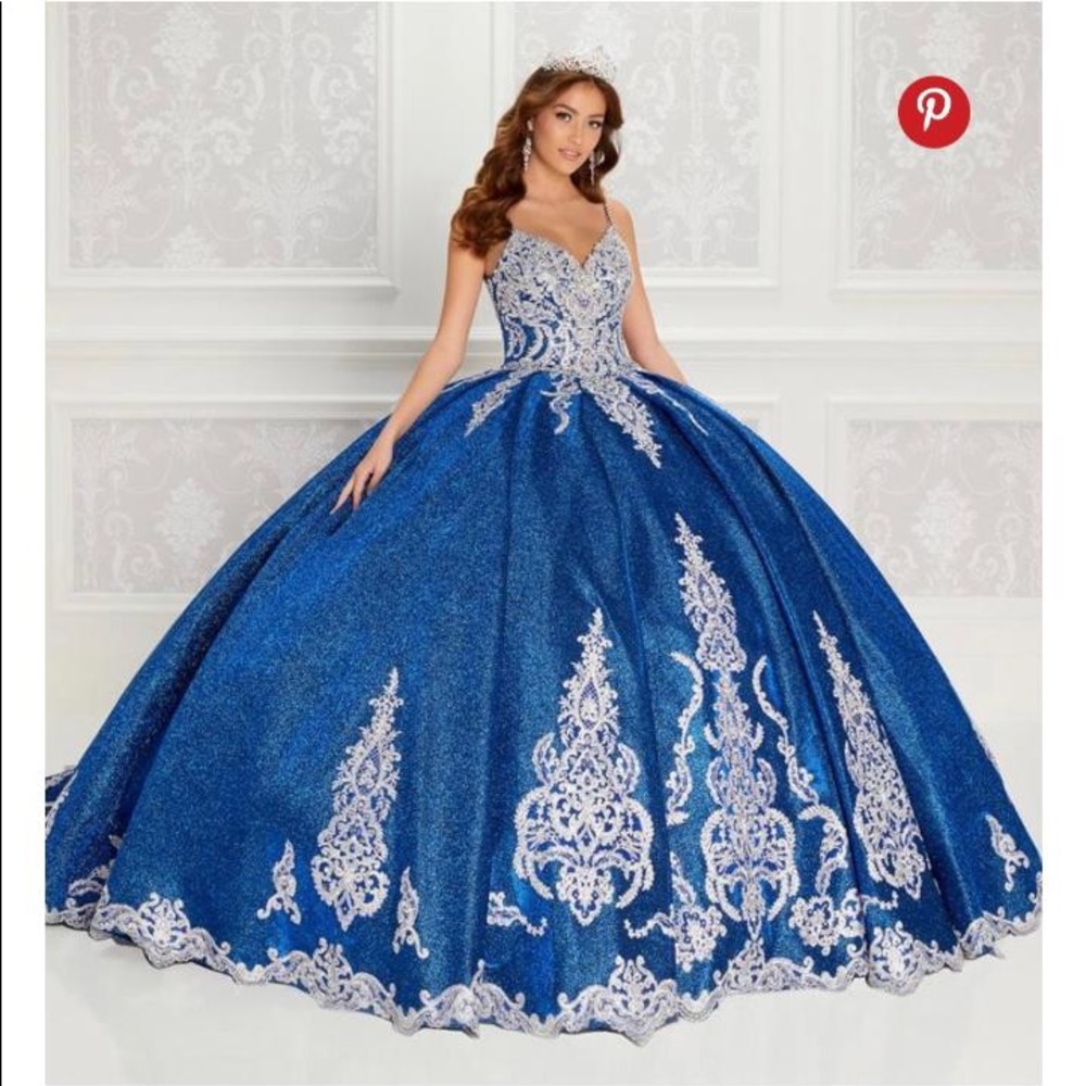Dress she Never wore. It’s still in plastic and Box. The color is Ice Blue